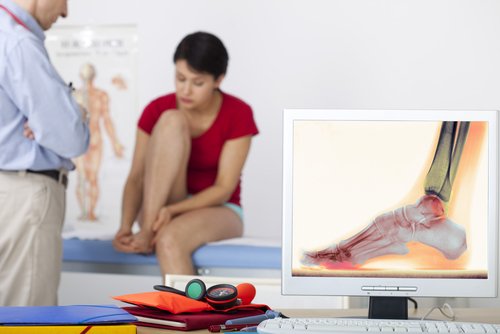 Woman Getting Foot Consultation from Podiatrist